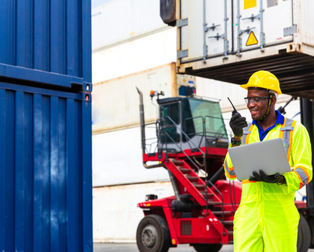 Foreman is controlling air or sea freight. Foreman works with la Foreman is controlling air or sea freight. Foreman works with laptop computer radio to communicate with forklift drivers.